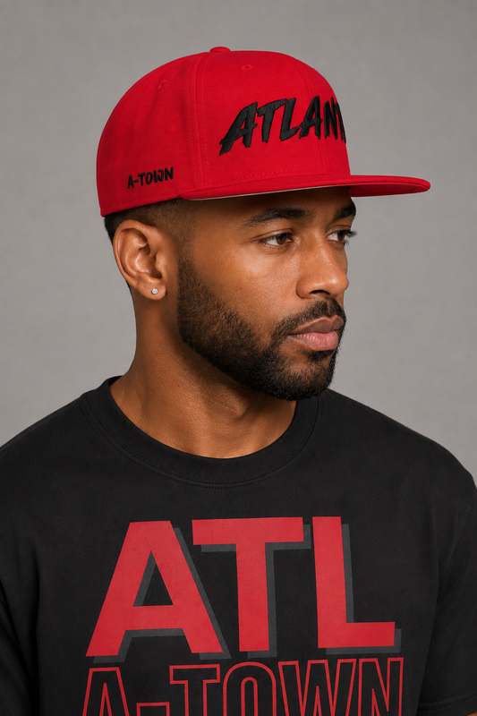 Atlanta A-Town Red Embroidered Snapback Hat — side-profile Atlanta model close-up showing black A-TOWN side embroidery and black ATLANTA front lettering | City 2 City Wear