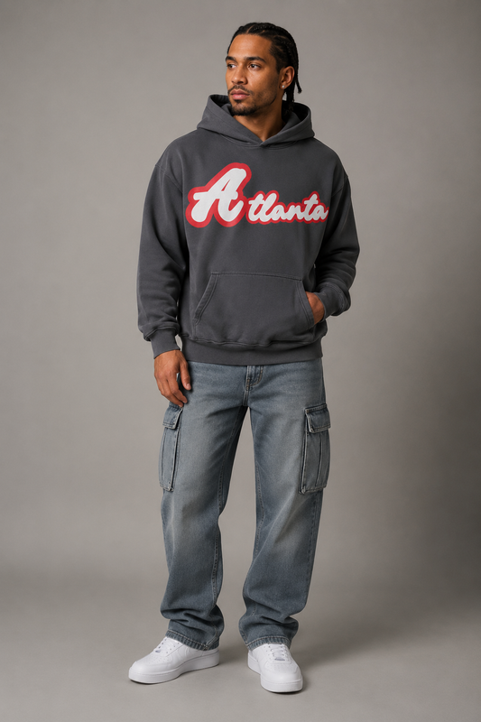 Atlanta Script 440 GSM Heavyweight Washed Oversized Hoodie, Carbon Gray three-quarter front full-body men’s studio model photo, Atlanta | City 2 City Wear