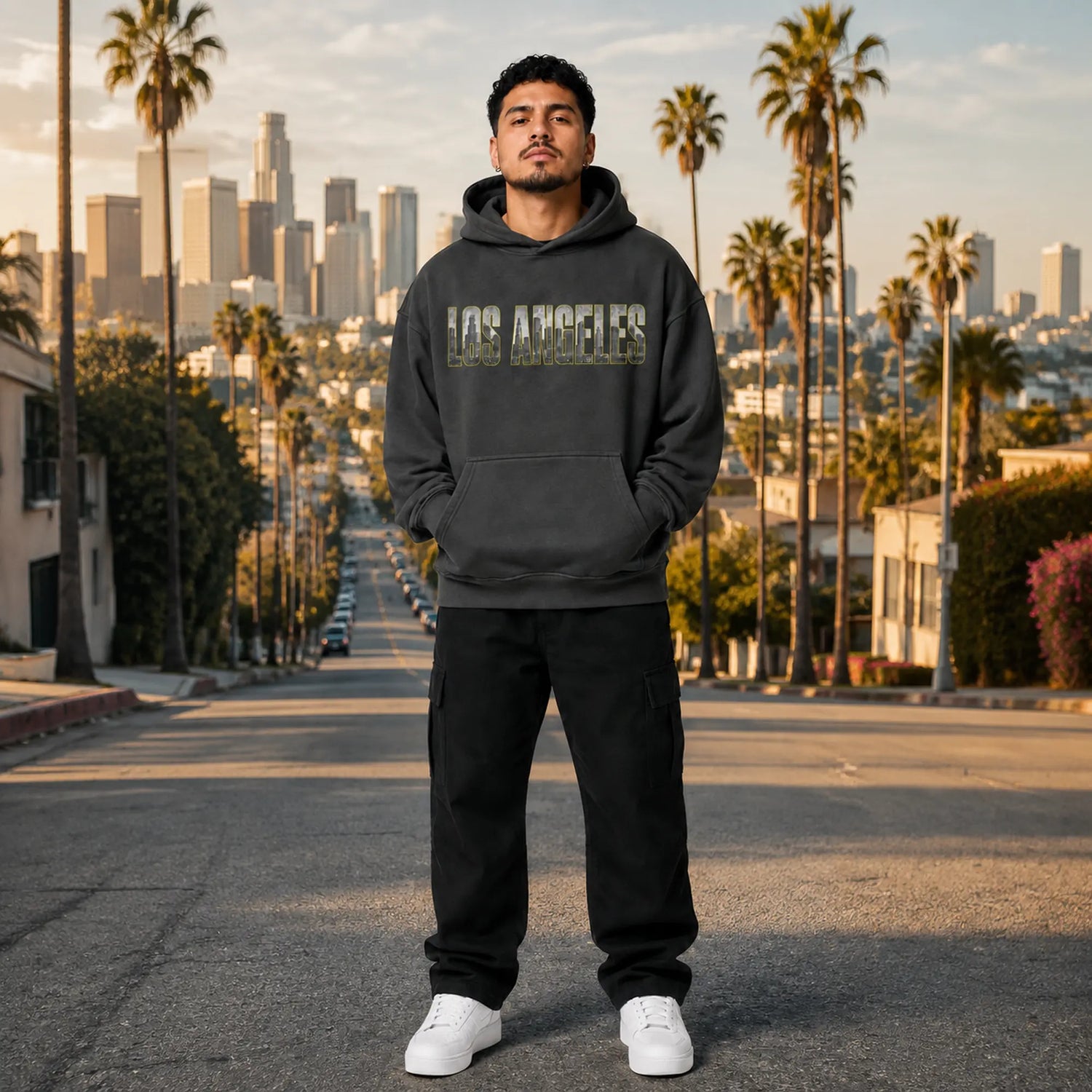 City 2 City Wear Los Angeles Collection featuring a model in the City of Angels 440 GSM oversized hoodie on a palm-lined Los Angeles street