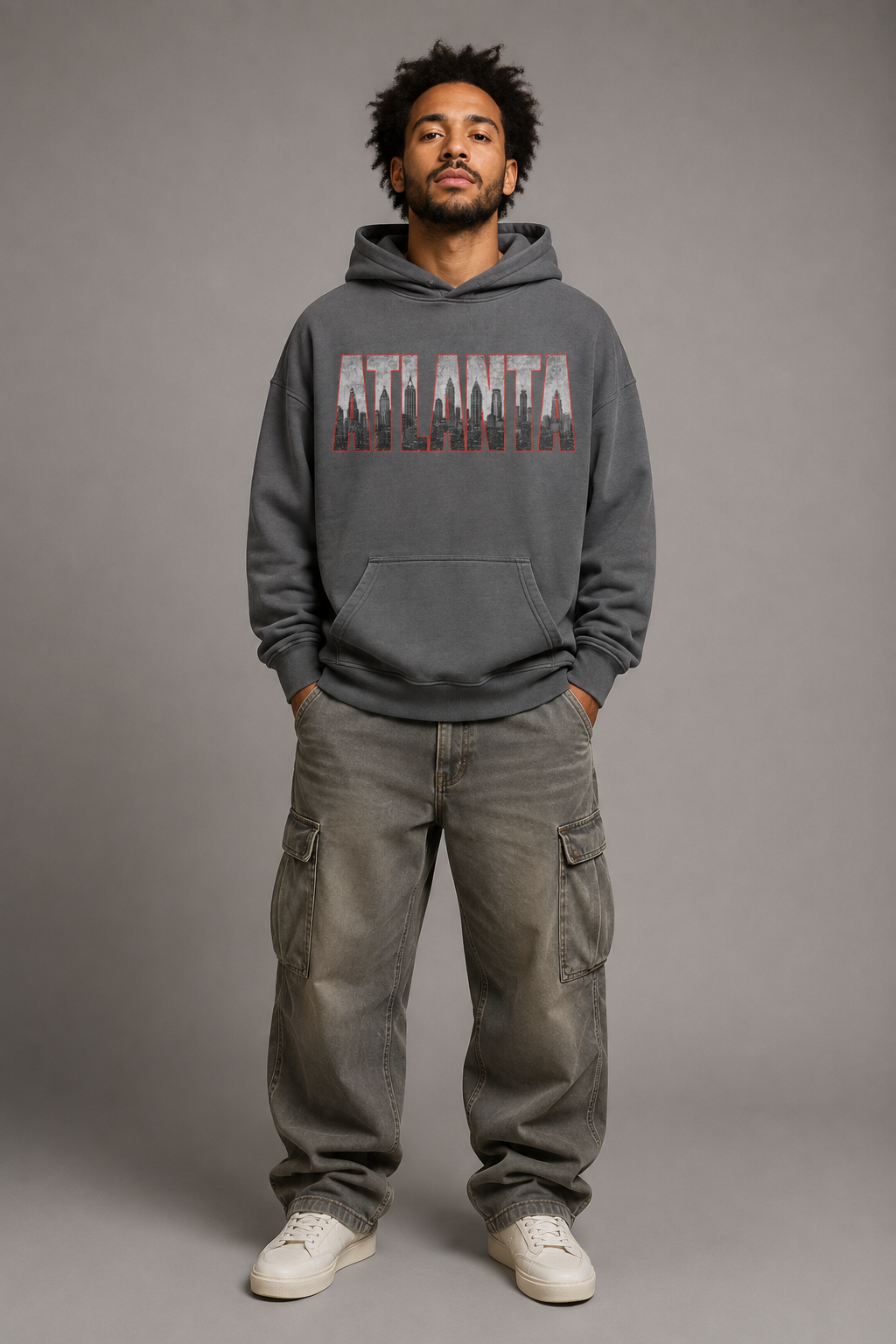 Atlanta A-Town Skyline 440 GSM Oversized Hoodie, Carbon Gray front-view full-body men’s studio model photo, Atlanta | City 2 City Wear