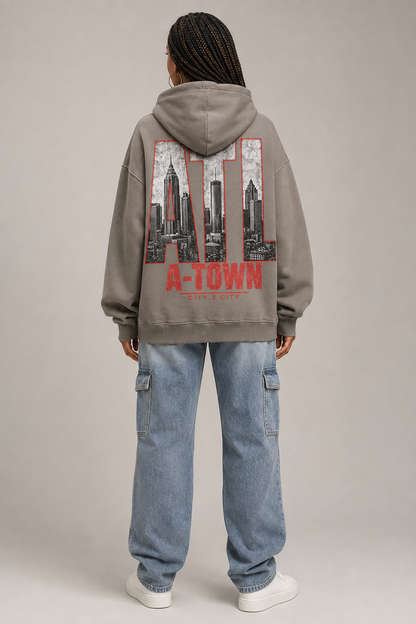 Atlanta A-Town Skyline 440 GSM Oversized Hoodie, Friar Gray back-view full-body women’s studio model photo, Atlanta | City 2 City Wear