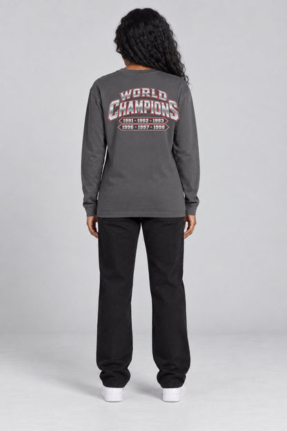 Chicago 6-Time City Champions dark gray 220 GSM long-sleeve T-shirt on female model – full-body back view with small centered championship artwork | City 2 City Wear