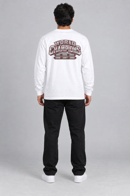 Chicago 6-Time City Champions white 220 GSM long-sleeve T-shirt on male model – full-body back view with small centered championship artwork | City 2 City Wear