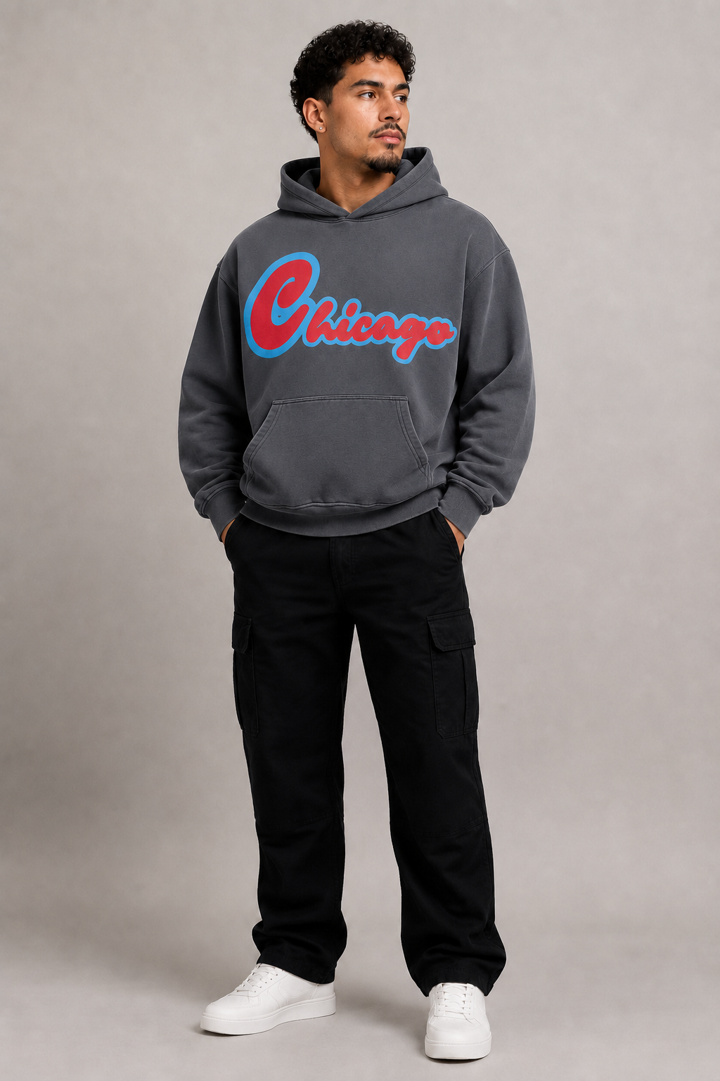 Chicago Script 440 GSM Heavyweight Washed Oversized Hoodie, Carbon Gray three-quarter front full-body men’s studio model photo, Chicago | City 2 City Wear
