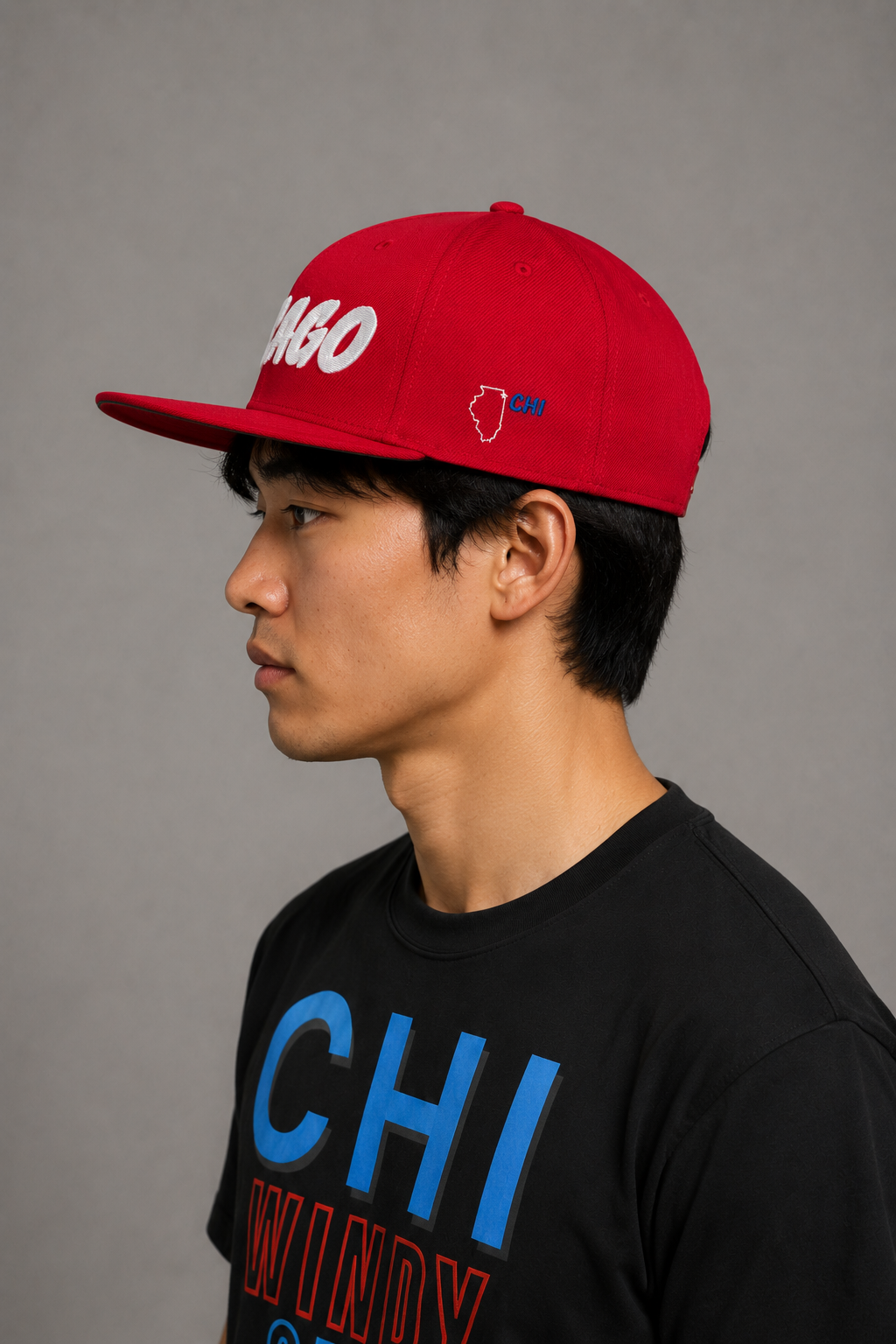 Chicago Windy City Red Embroidered Snapback Hat — opposite-side Chicago model close-up showing white Illinois state outline and blue CHI embroidery | City 2 City Wear