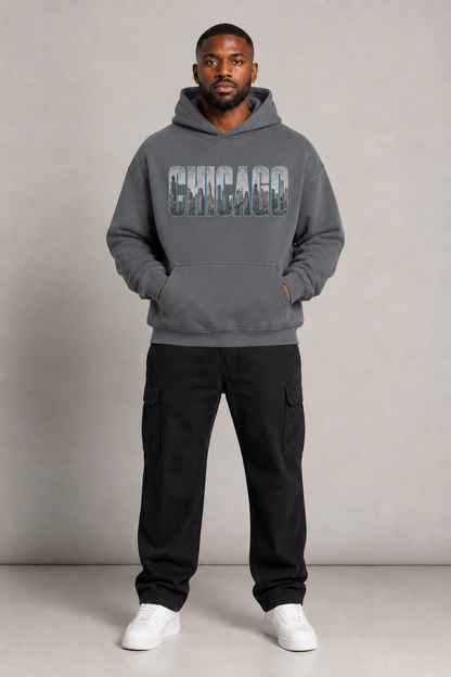 Chicago Windy City Skyline 440 GSM Oversized Hoodie, Carbon Gray front-view full-body men’s studio model photo, Chicago | City 2 City Wear