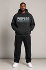 Chicago Windy City Skyline 440 GSM Oversized Hoodie, Faded Black front-view full-body men’s studio model photo, Chicago | City 2 City Wear