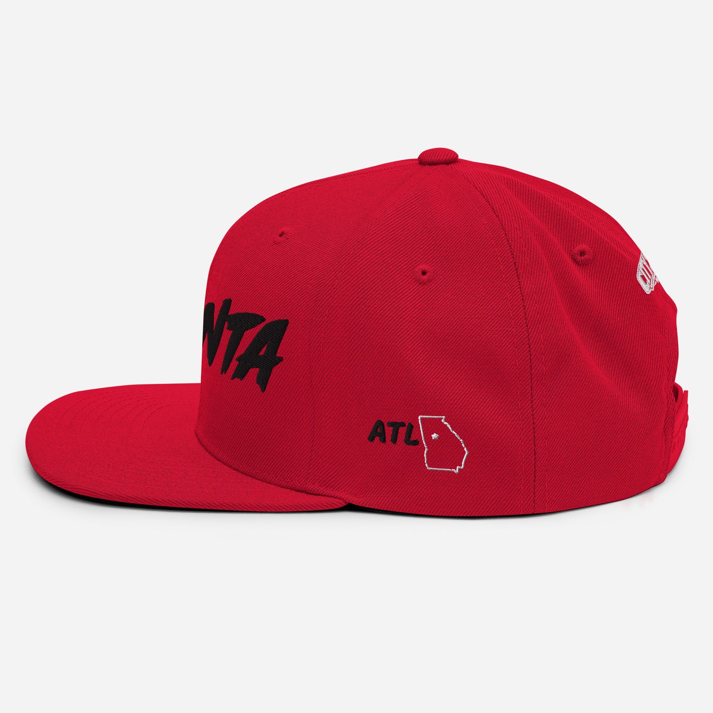 Angled view of a red snapback featuring black ATLANTA embroidery and Georgia outline side detailing