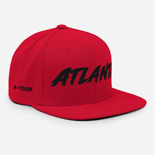 Angled view of a red Atlanta snapback featuring black front embroidery and black A-TOWN side lettering.