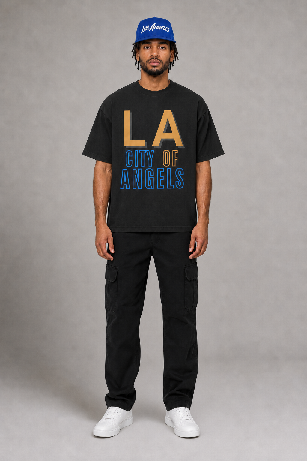 Los Angeles City of Angels Royal Blue Embroidered Snapback Hat — full-body Los Angeles streetwear model wearing royal blue snapback and black LA City of Angels graphic T-shirt | City 2 City Wear