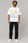 Los Angeles City of Angels Skyline 240 GSM Boxy T-Shirt, White front-view full-body men’s studio model photo, Los Angeles | City 2 City Wear