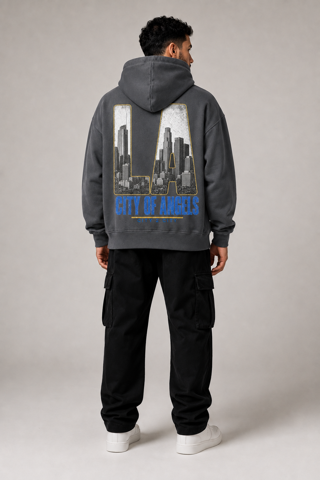 Los Angeles City of Angels Skyline 440 GSM Oversized Hoodie, Carbon Gray back-view full-body men’s studio model photo, Los Angeles | City 2 City Wear