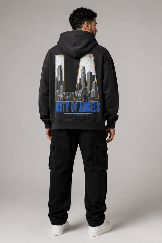 Los Angeles City of Angels Skyline 440 GSM Oversized Hoodie, Faded Black back-view full-body men’s studio model photo, Los Angeles | City 2 City Wear