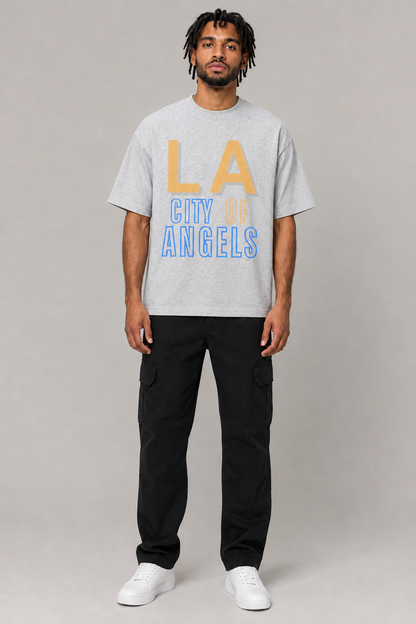 Los Angeles City of Angels Skyline 240 GSM Boxy T-Shirt, Heather Gray front-view full-body men’s studio model photo, Los Angeles | City 2 City Wear