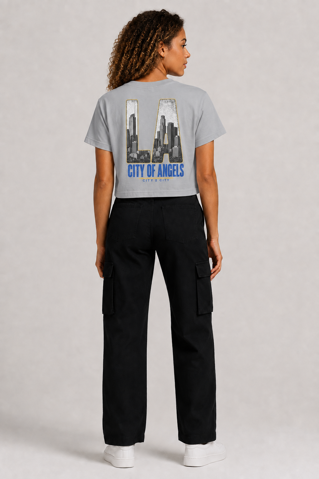 Los Angeles City of Angels Skyline Women’s Crop T-Shirt, Light Gray back-view full-body women’s studio model photo, Los Angeles | City 2 City Wear