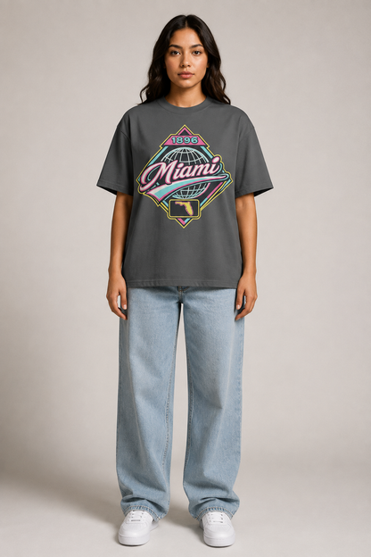 Miami 1896 Heritage 240 GSM Heavyweight Boxy T-Shirt, Graphite Gray front-view full-body women’s studio model photo, Miami | City 2 City Wear