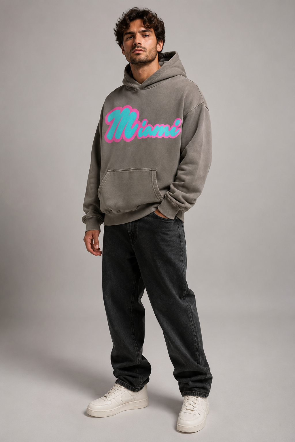 Miami Script Teal & Pink 440 GSM Heavyweight Washed Oversized Hoodie, Friar Gray three-quarter front full-body men’s studio model photo, Miami | City 2 City Wear