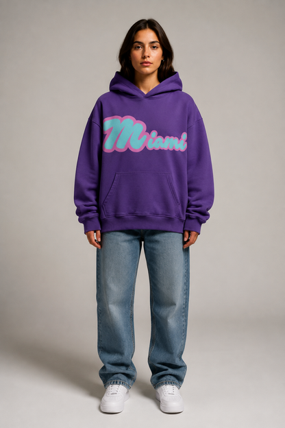 Miami Script Teal & Pink 440 GSM Heavyweight Washed Oversized Hoodie, Purple Haze front-view full-body women’s studio model photo, Miami | City 2 City Wear