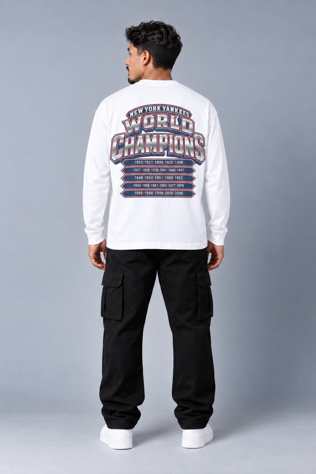 New York 27-Time City Champions white 220 GSM long-sleeve T-shirt on male model – full-body back view | City 2 City Wear
