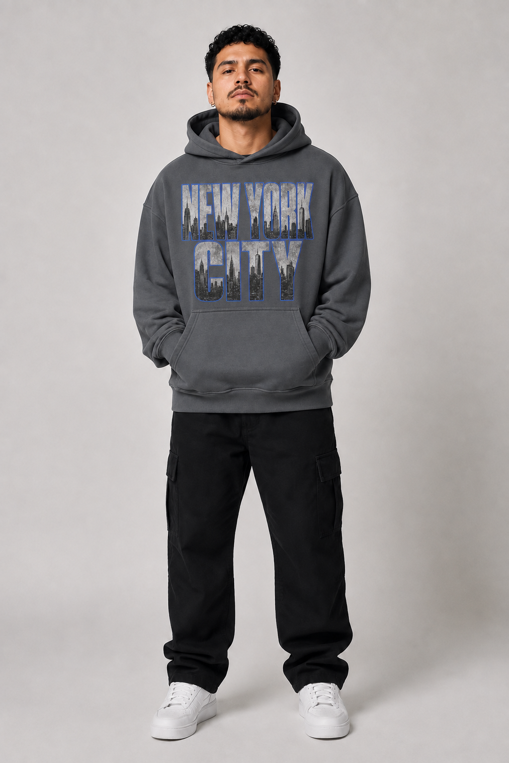 New York City Concrete Jungle Skyline 440 GSM Oversized Hoodie, Carbon Gray front-view full-body men's studio model photo | City 2 City Wear