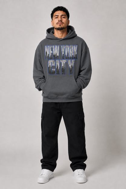 New York City Concrete Jungle Skyline 440 GSM Oversized Hoodie, Carbon Gray front-view full-body men's studio model photo | City 2 City Wear