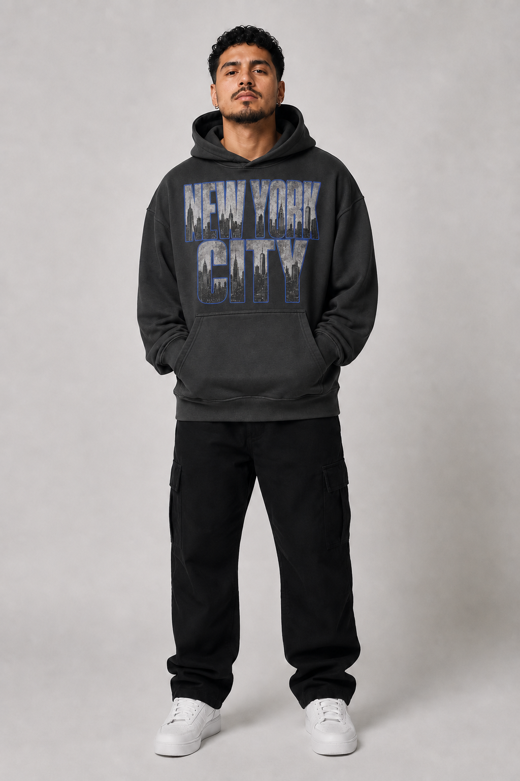 New York City Concrete Jungle Skyline 440 GSM Oversized Hoodie, Faded Black front-view full-body men's studio model photo | City 2 City Wear