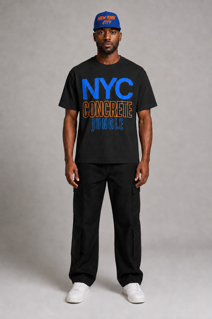 NYC Concrete Jungle Royal Blue Embroidered Snapback Hat — full-body New York City streetwear model wearing royal blue snapback with orange-red NEW YORK CITY embroidery | City 2 City Wear