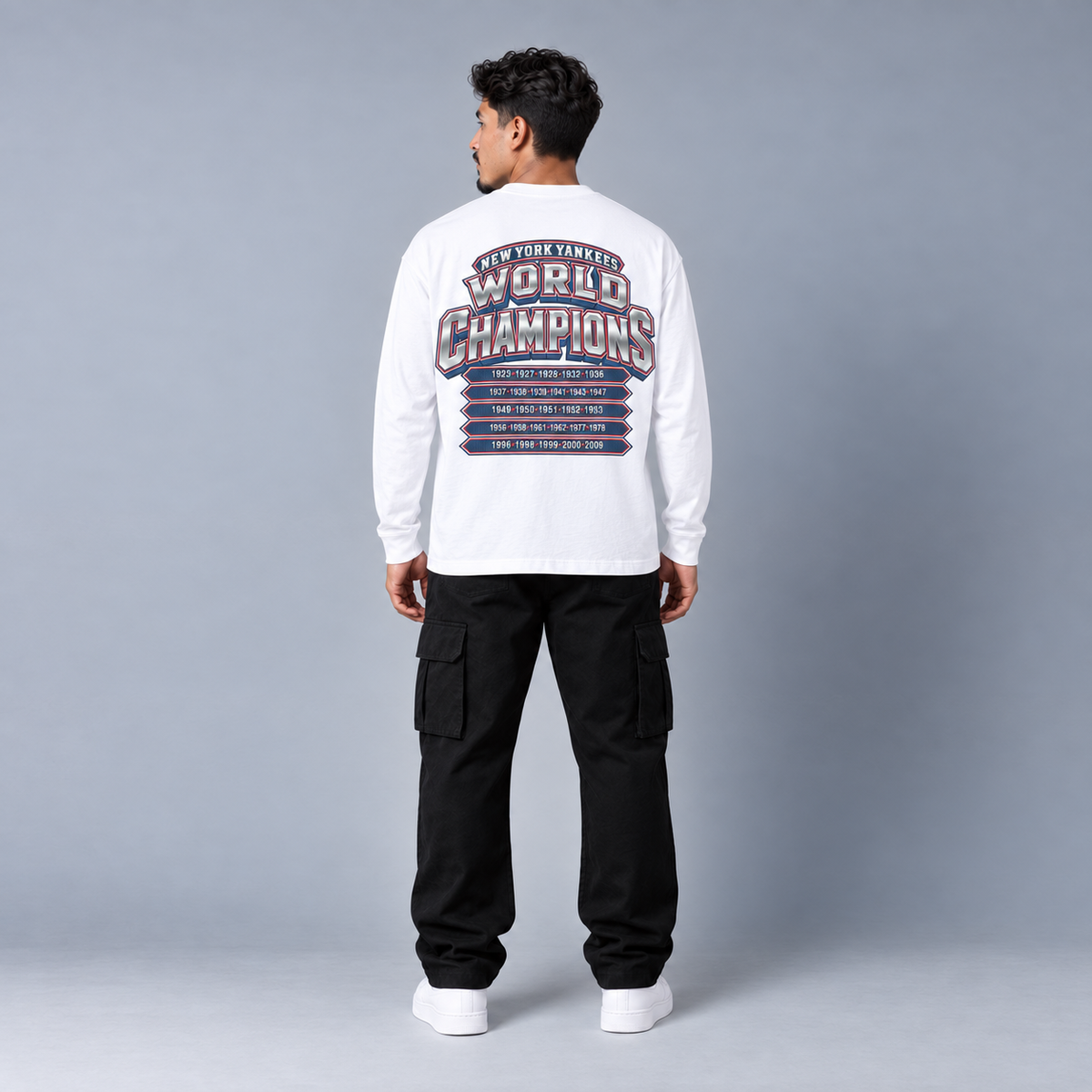 NYY City Champions white long sleeve T-shirt back view full-body model with championship years graphic | City 2 City Wear