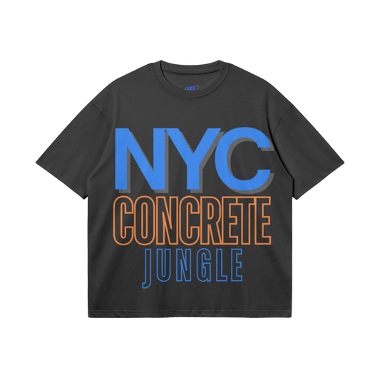 Black heavyweight boxy T-shirt featuring oversized royal-blue NYC lettering with a gray shadow, orange CONCRETE typography, and an outlined blue JUNGLE design.