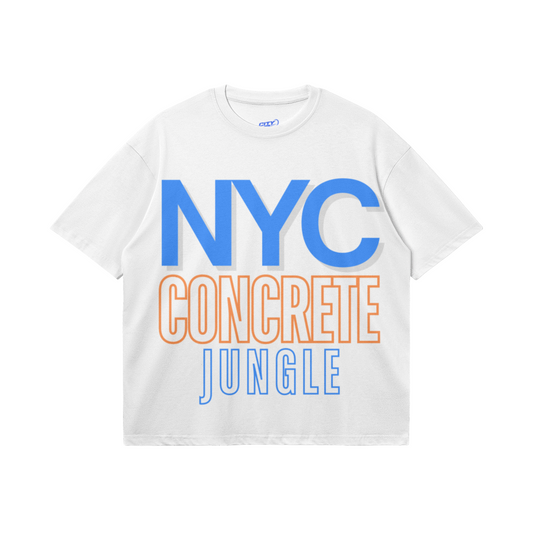 White heavyweight boxy T-shirt featuring oversized royal-blue NYC lettering with a gray shadow, orange CONCRETE typography, and an outlined blue JUNGLE design.