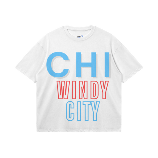 White heavyweight boxy T-shirt featuring oversized light-blue CHI lettering, red WINDY typography, and an outlined light-blue CITY design.
