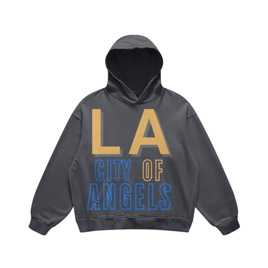 ront view of a washed-charcoal oversized Los Angeles hoodie with gold LA lettering and blue City of Angels typography.