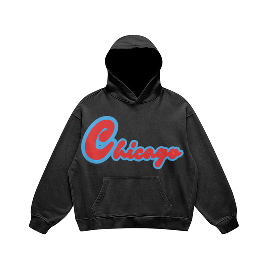 Front view of a washed-black heavyweight oversized hoodie featuring red Chicago script with a bold light-blue outline